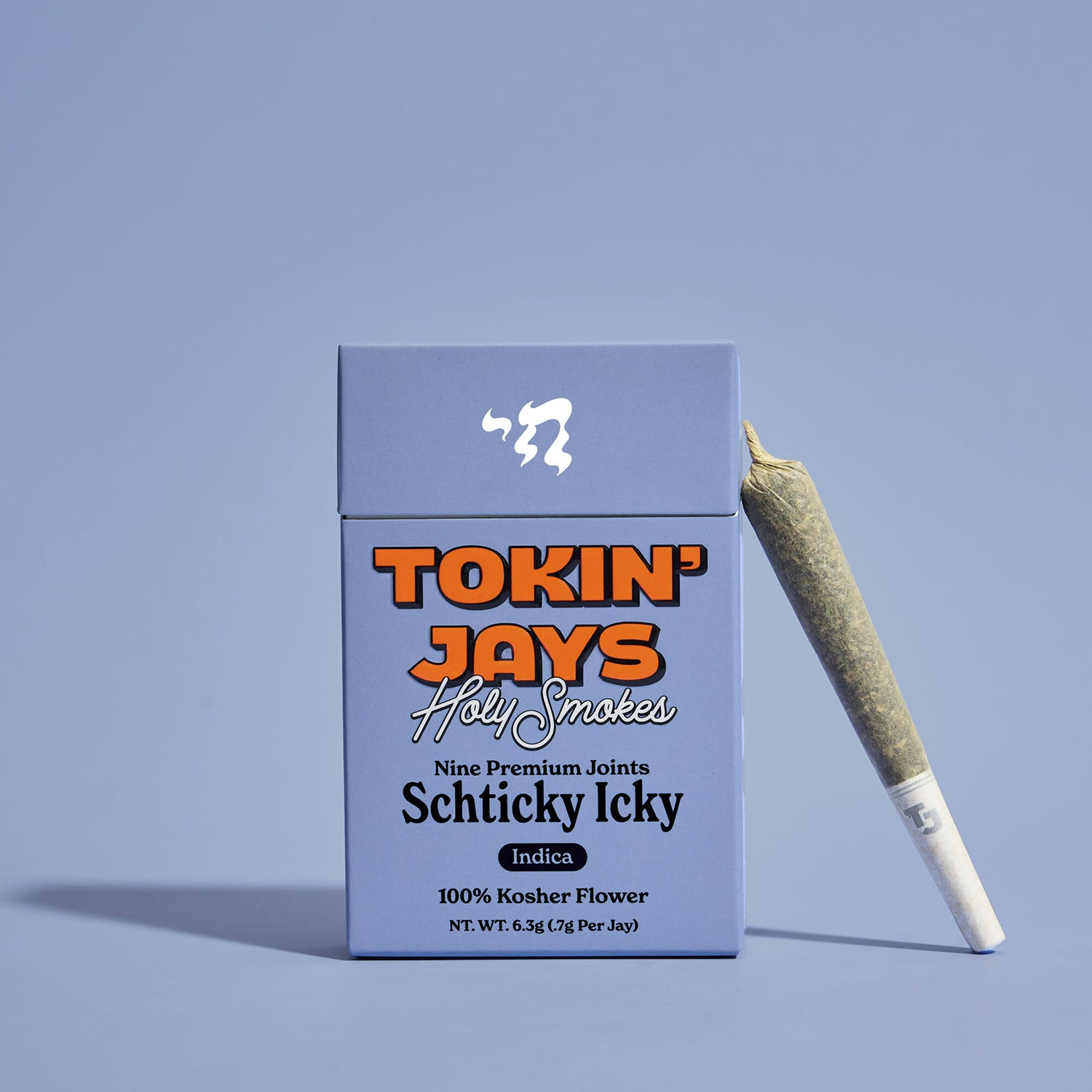 Box of 'Tokin' Jays Holy Smokes' with a joint on a light blue background