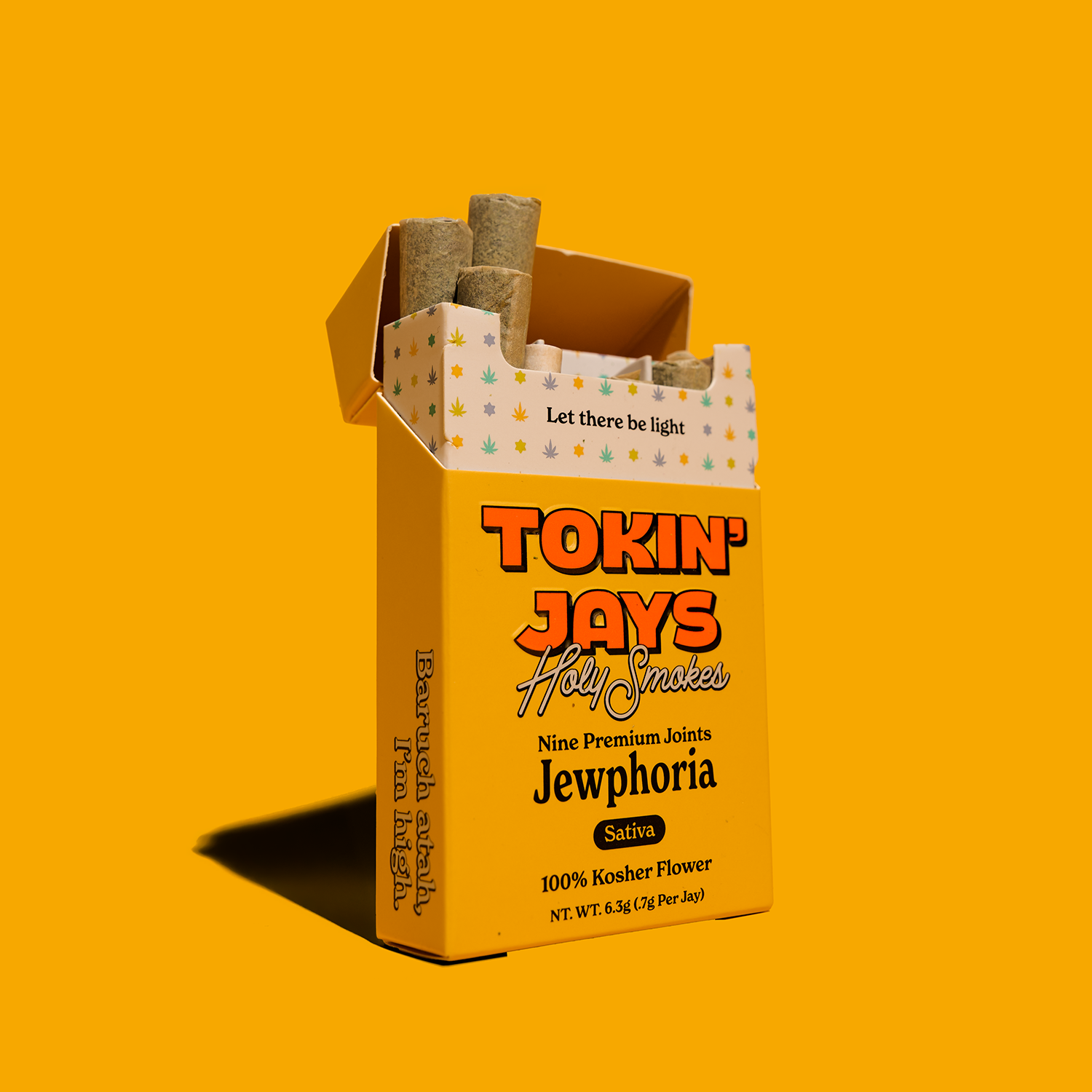 Box of Tokin Jays Holy Smokes on a yellow background