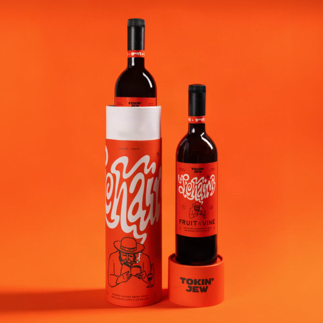 A bottles of uice with orange labels are displayed against a solid orange background. One tall bottle is partially housed in a cylindrical orange-and-white branded box, and one shorter bottle stands in a matching orange base.