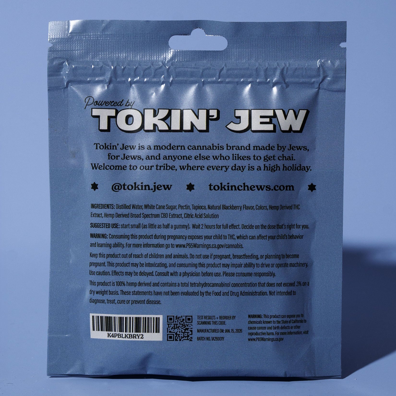 Blue packaging with 'Tokin' Jew' branding on a blue background
