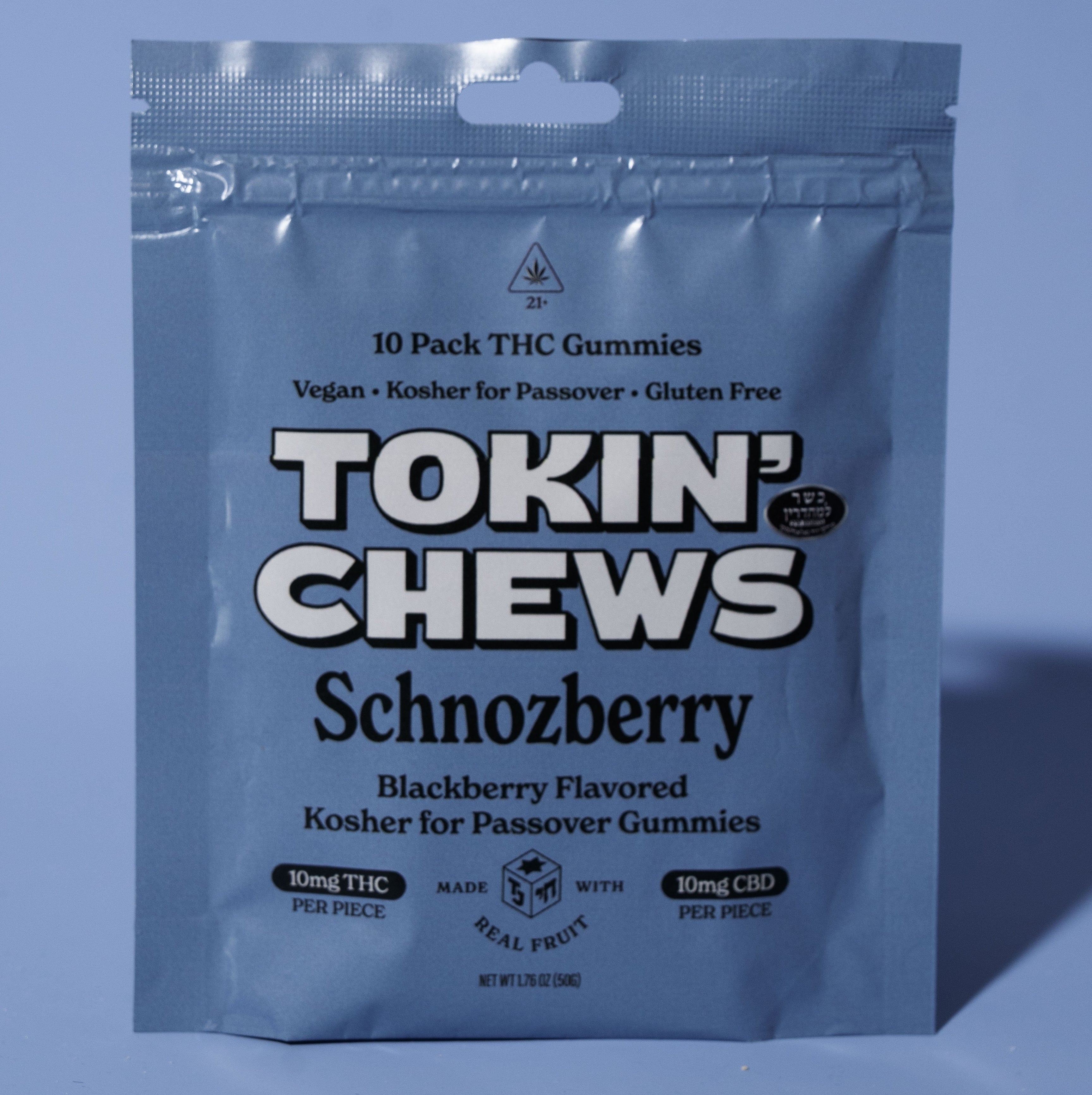 Packaging of Tokin' Chews Schnozberry THC gummies on a blue background