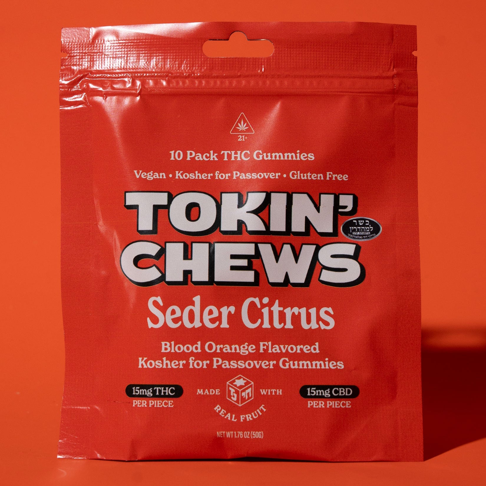 orange package of Tokin' Chews Seder Citrus THC gummies on an orange background