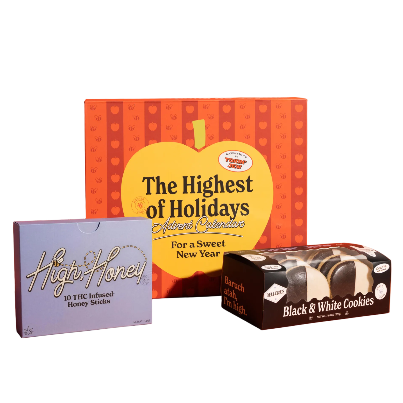 Three packaged products arranged on a solid orange studio background: a purple box of Highs Honey THC-infused honey sticks, a large red and yellow gift box reading 'The Highest of Holidays' with a yellow apple graphic, and a black box of Black & White Cookies.