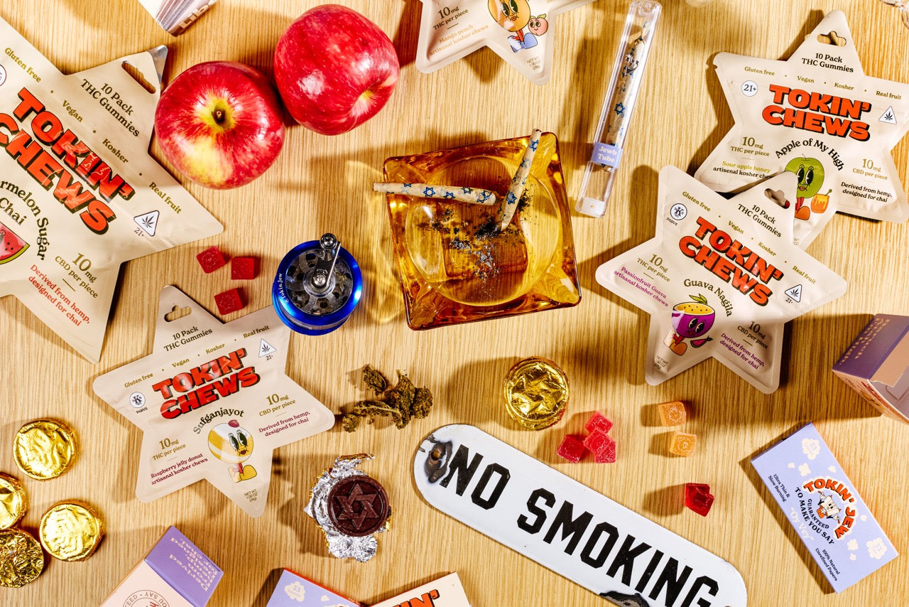Assorted Tobin Chews products on a wooden surface with 'No Smoking' sign.